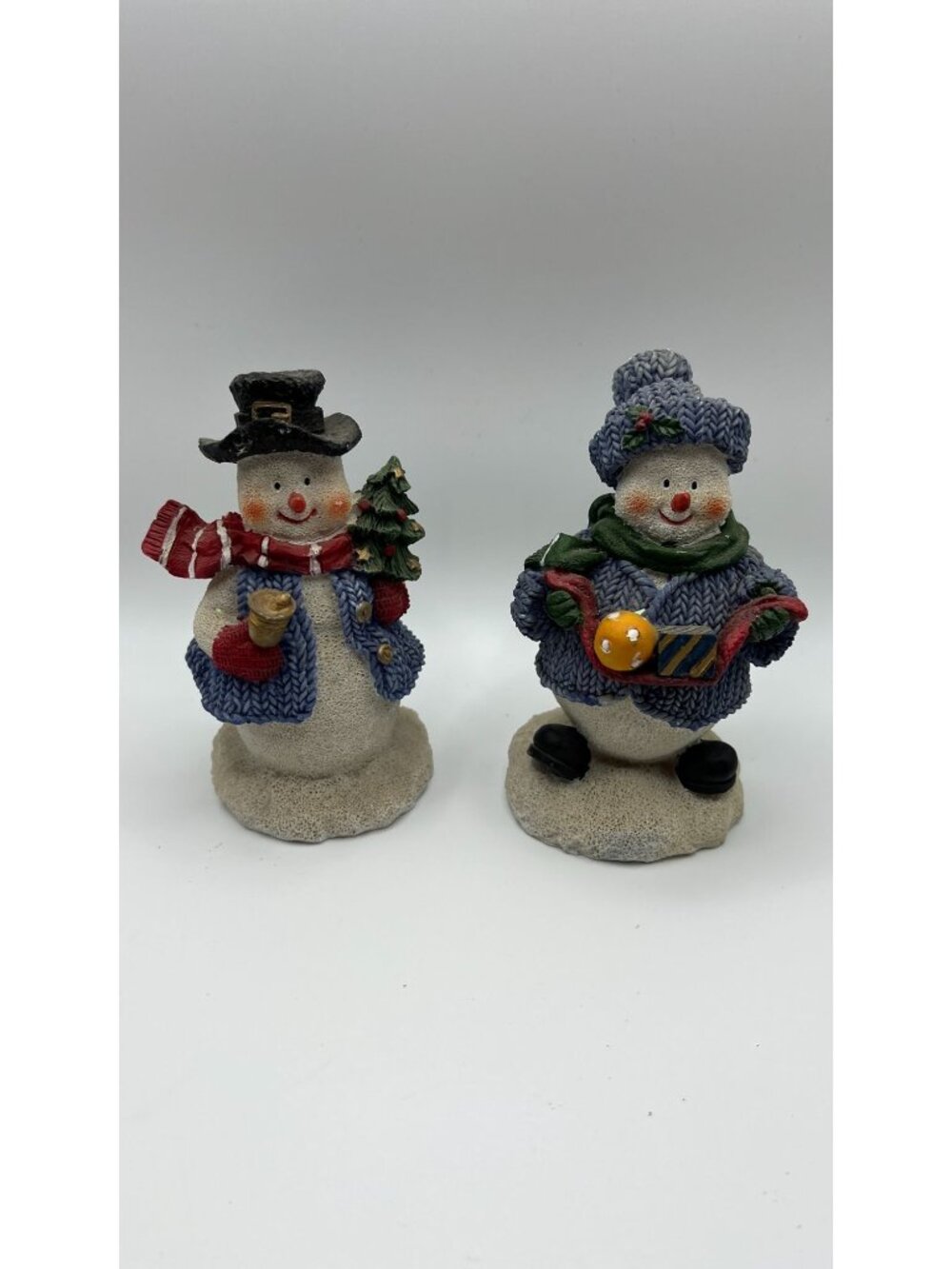Festive Snowmen Figurines In Winter Knit Outfits - Holiday Decor Collectibles
